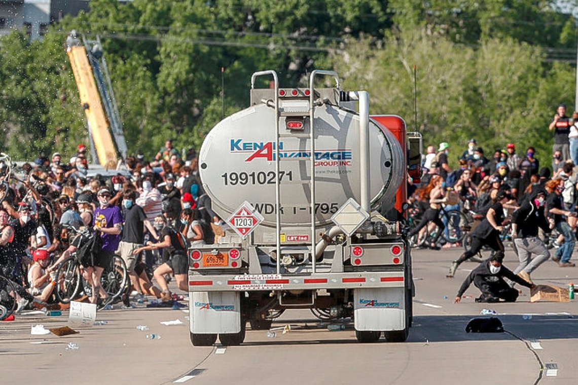 Tanker truck drives into protesters during weekend of unrest